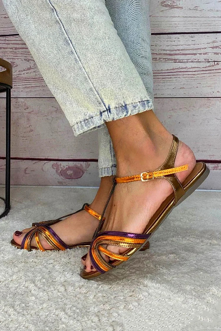 NERINA | Lage sandalen met meerdere banden en elegante metallic details