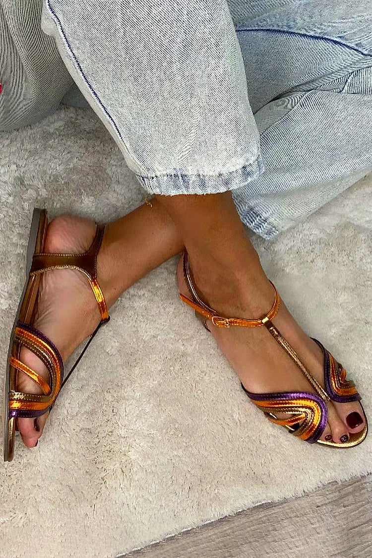 NERINA | Lage sandalen met meerdere banden en elegante metallic details