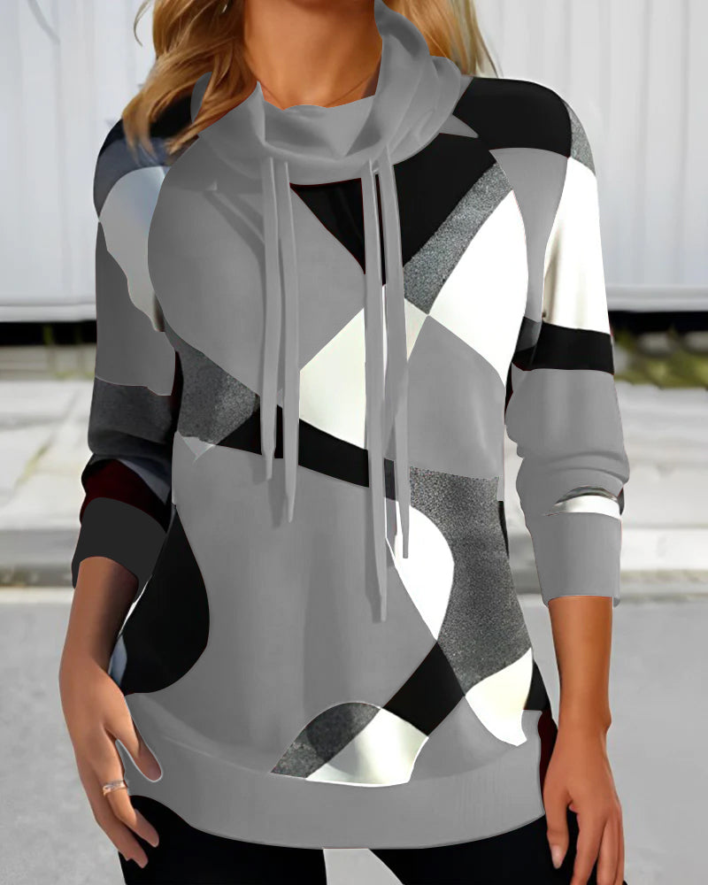 Clara | Trui met artistieke print en capuchon