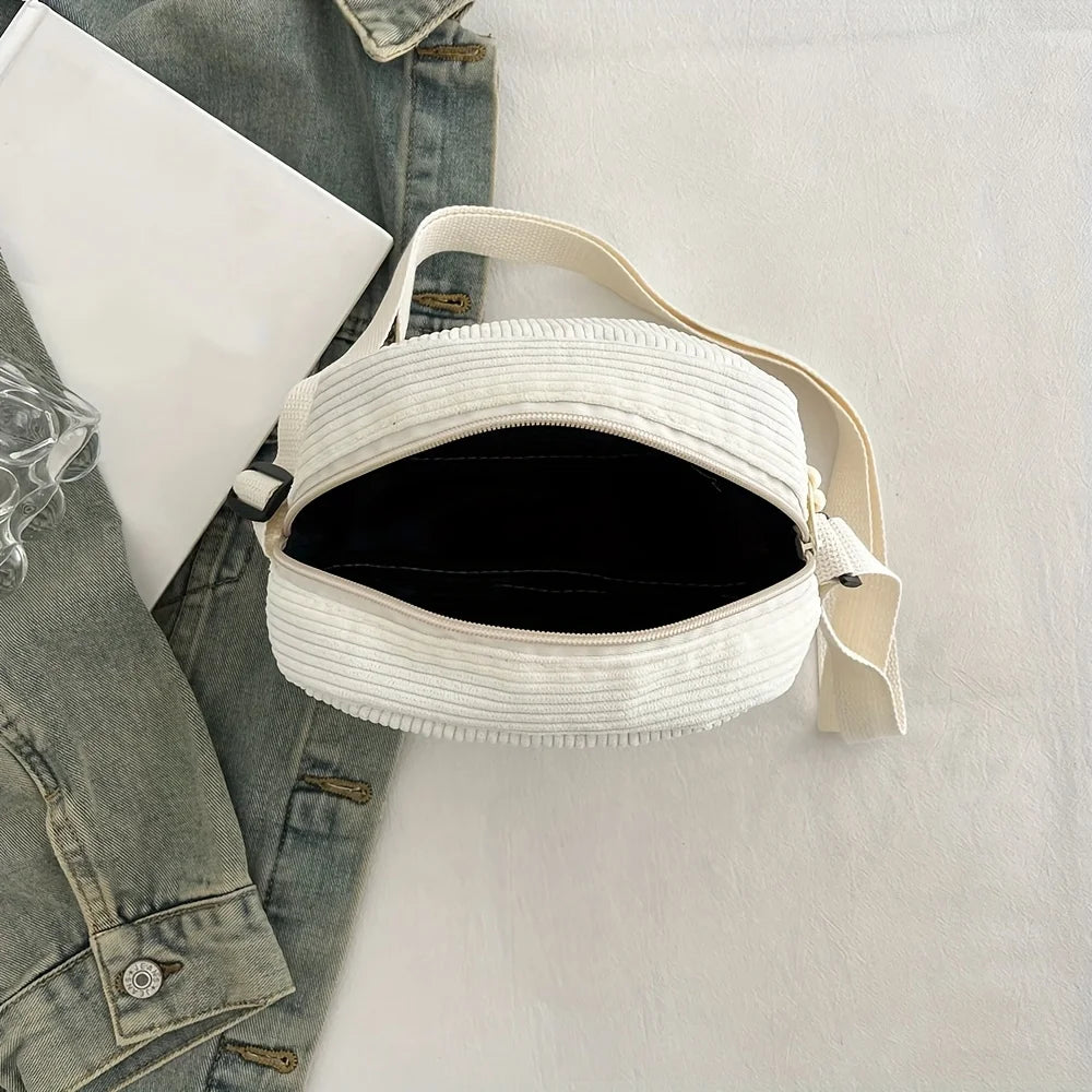 Odette | Compacte schoudertas