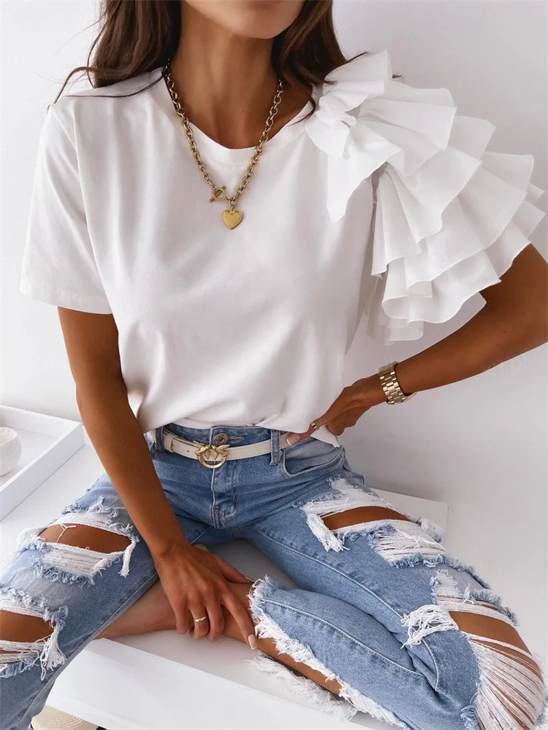 Anna | Trendy top met statement rufflemouw