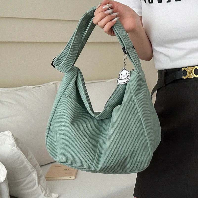Ingrid | Ruime schoudertas met ritssluiting