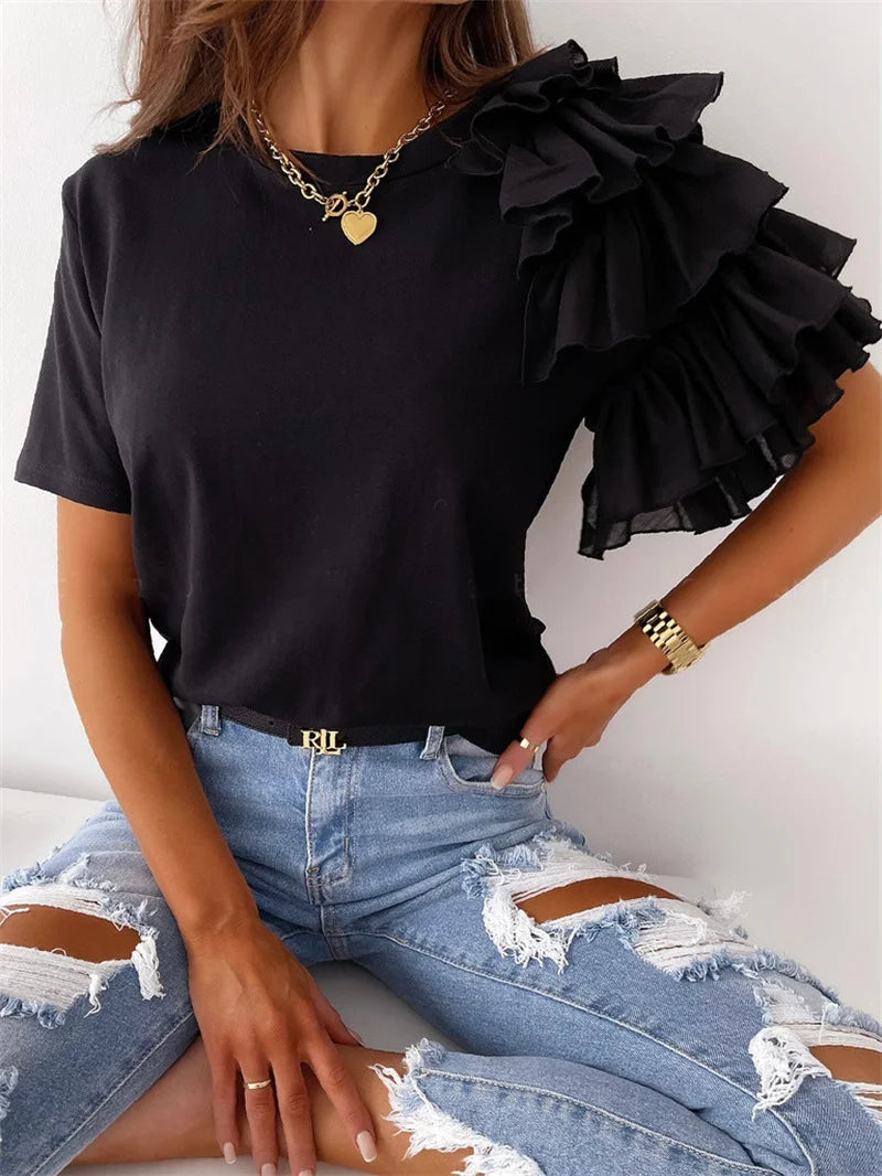 Anna | Trendy top met statement rufflemouw