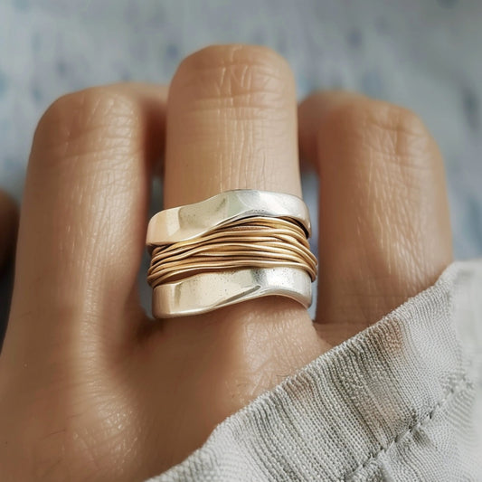 Ring van zilver-goud draad