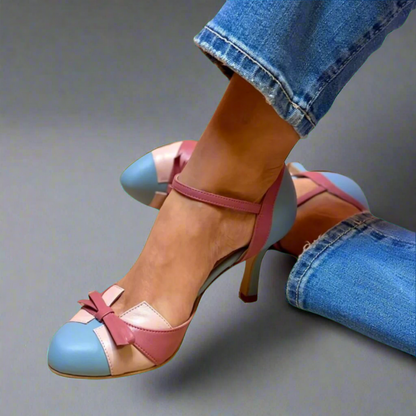 LUCINDA | Elegante kleurblok décolleté met een mooie lintversiering