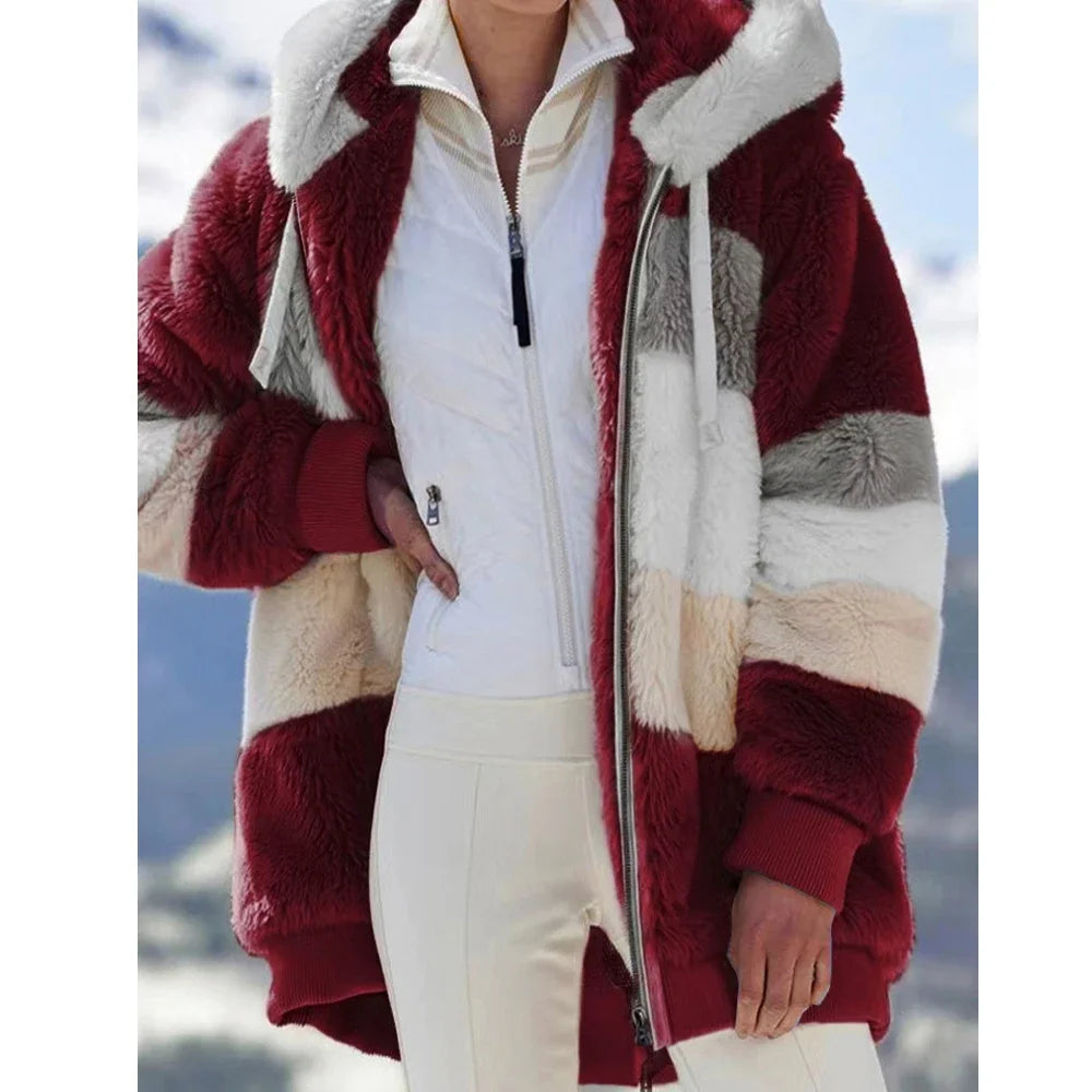 Hazel | Oversized jas met capuchon, zakken en ritssluiting