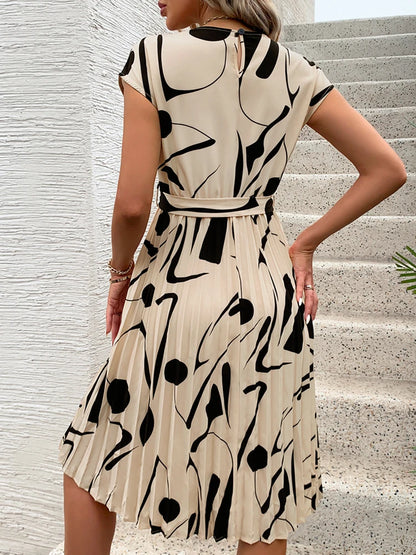 Allaine | Elegante geplisseerde midi-jurk met tailleceintuur
