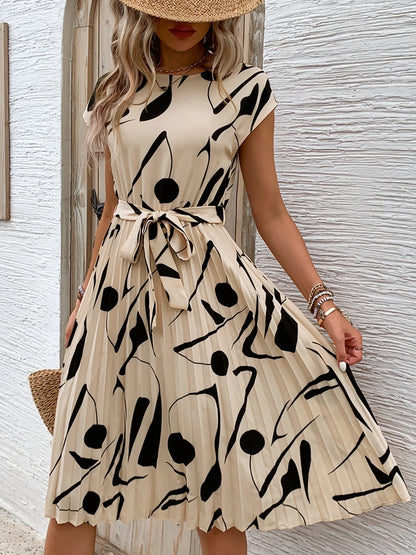 Allaine | Elegante geplisseerde midi-jurk met tailleceintuur