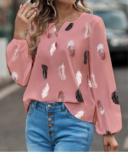 Nefeli | Elegante blouse met speelse verenprint