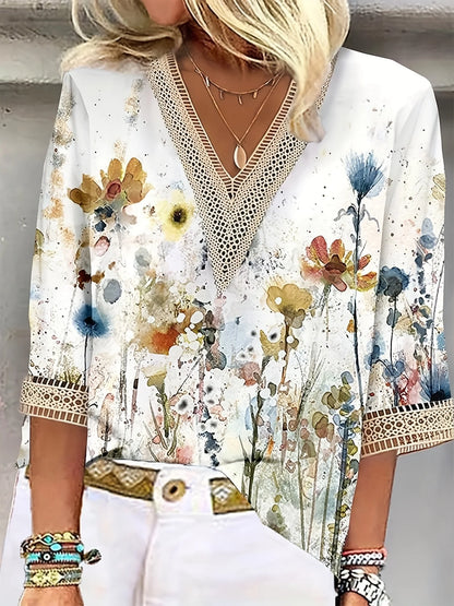Nela | Elegante blouse met speelse print