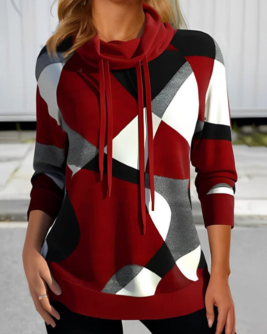 Clara | Trui met artistieke print en capuchon
